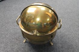 Four Indian brass dome topped food warmers on stands