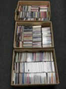 Three boxes of various CDs
