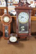 A Highlands 31 day wall clock together with a 31 day regulator clock and Comitti of London mantel