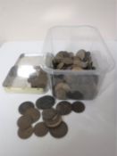 A plastic tub containing Georgian and Victorian pennies and half pennies,