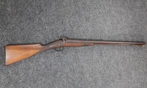 A 19th century percussion cap double-barrelled shotgun
