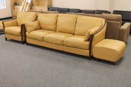A wooden framed Italian three seater settee,