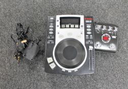 A Vestex CDx-05 professional CD player and a guitar effect pedal