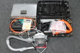 A cased Black & Decker electric drill, cased Black & Decker Scorpion saw,