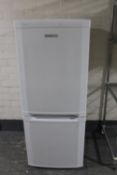 A Beko upright fridge freezer