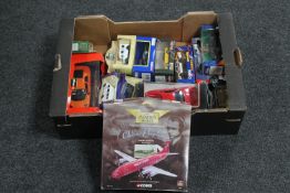 A box of boxed die cast vehicles, Revell, Corgi,