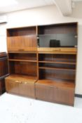 A Danish two section rosewood effect bookcase