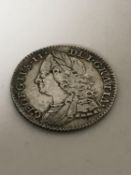 A George II six pence dated 1758
