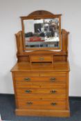 An Edwardian satinwood mirror back dressing table