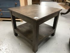 A contemporary two tier lamp table