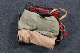 A box of lady's leather handbags