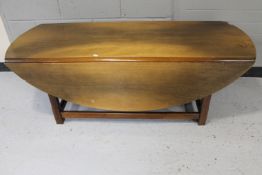 A mahogany drop leaf coffee table
