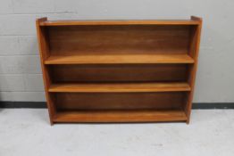 A mid 20th century Danish teak open bookshelf