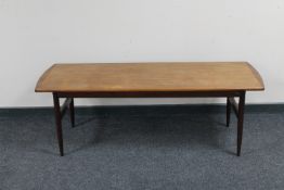 A teak low coffee table