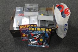 A box containing boxed Batman die cast vehicles