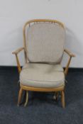 An Ercol spindle back armchair