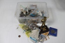 A tub containing brass model of a sailor of plinth and a large quantity of pre-decimal coins,