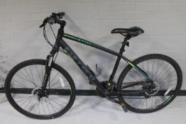 A lady's Carrera Crossfire off-road bike