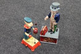 Two novelty cast iron figures;