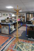 A bentwood hat and coat stand together with a metal and glass topped stool