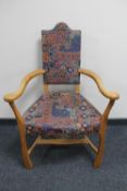 A continental blond oak armchair