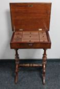 A 19th century inlaid mahogany work table