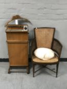 A bergere armchair and a trouser press