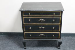 An antique pine painted four drawer chest