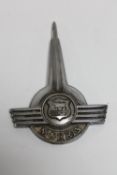 A large vintage Morris van badge