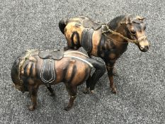 Two leather figures of horses