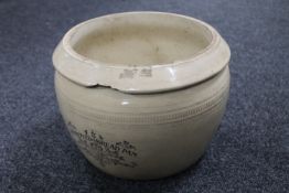 An antique stoneware improved bread pan