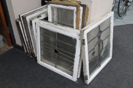 Eleven framed stained glass windows