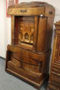 A 19th century continental mahogany secretaire cabinet,