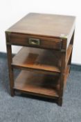 A three tier ship's style lamp table with brass mounts