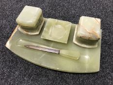 An onyx desk stand with letter opener and ashtray