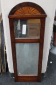 A continental mahogany domed topped hall mirror