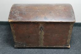 A 19th century pine domed topped shipping trunk