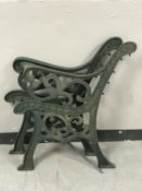 A pair of cast iron bench ends