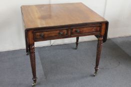 A 19th century mahogany flap sided table on turned legs