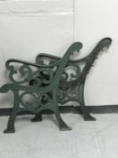 A pair of cast iron bench ends