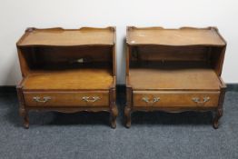 A pair of oversized mahogany bedside tables
