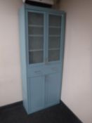 A painted pine Ikea bookcase fitted cupboard and drawer beneath