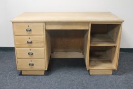 A pine twin pedestal writing desk