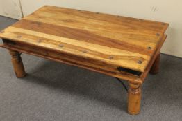 A sheesham wood coffee table
