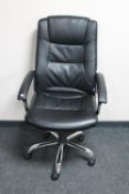 A high backed swivel office armchair