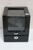 An electric automatic watch winder