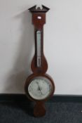A Victorian inlaid mahogany banjo barometer by F Robson & Company of Newcastle upon Tyne
