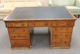 A Victorian mahogany twin pedestal partner's desk