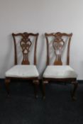 A pair of dining chairs