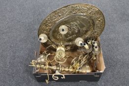 Two continental brass light fittings and a brass wall plaque